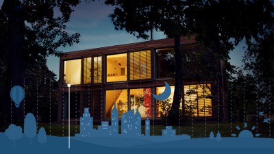 Une maison éclairée de l'extérieur avec simulation de présence